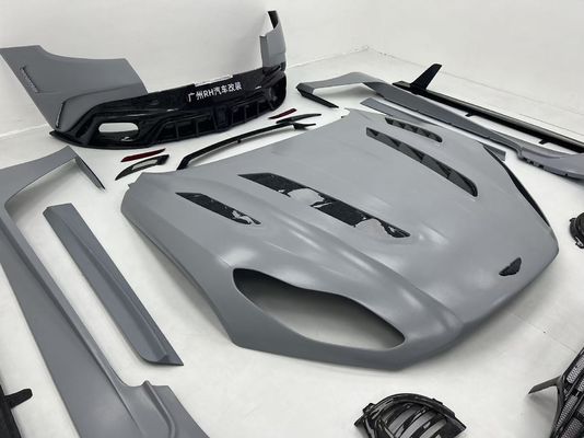 アストンマーティン DB11 カーボンファイバーボディキット DB11 マンスリースタイル フロントとバック バンパーサイドスカート フェンダー フードスポイラー