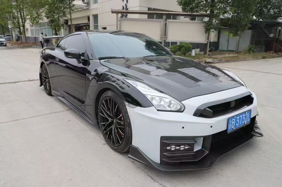 ニッサン GTR カーボンファイバーボディ キット GTR r35 アップグレード 2024ニスモスタイル フロントとリア バンパースポイラー フードフェンダー