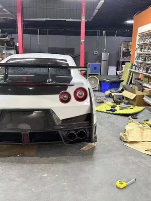 ニッサン GTR カーボンファイバーボディ キット GTR r35 アップグレード 2024ニスモスタイル フロントとリア バンパースポイラー フードフェンダー
