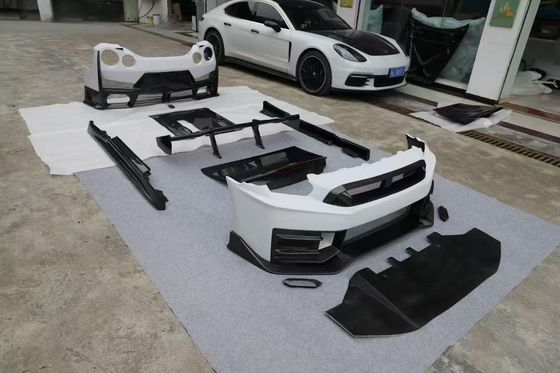 ニッサン GTR カーボンファイバーボディ キット GTR r35 アップグレード 2024ニスモスタイル フロントとリア バンパースポイラー フードフェンダー