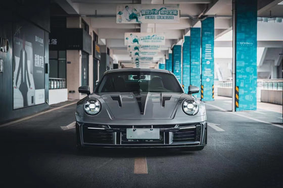 ポルシェ 911 992 カーボンファイバーボディキット 992 MIW様式のアップグレードされた前後バンパー・スポイラー・フード ワイドボディキット