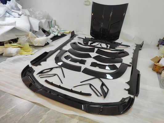 BMW XM カーボンファイバー ワイドボディ キット XM アップグレード RNG スタイル カーボンファイバー フロント リップ ディフューザー 輪アーチ スポイラー フード ワイドボディ