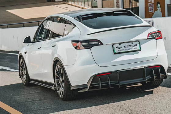 テスラ用のオートパーツ MODEL Y カーボンファイバーボディキット MODEL Y MIW様式のアップグレードされたカーボンファイバー フロントショベルディフューザー スポイラーボディキット