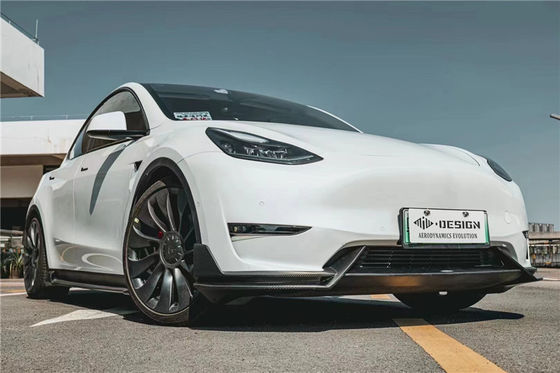 テスラ用のオートパーツ MODEL Y カーボンファイバーボディキット MODEL Y MIW様式のアップグレードされたカーボンファイバー フロントショベルディフューザー スポイラーボディキット