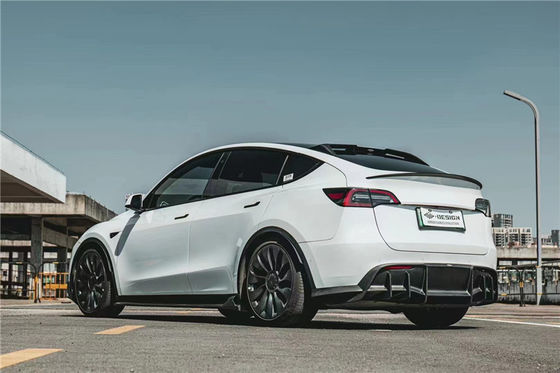 テスラ用のオートパーツ MODEL Y カーボンファイバーボディキット MODEL Y MIW様式のアップグレードされたカーボンファイバー フロントショベルディフューザー スポイラーボディキット
